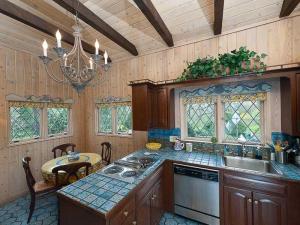 Who among us doesn't appreciate authentic-looking barn beams in a 1974 kitchen?